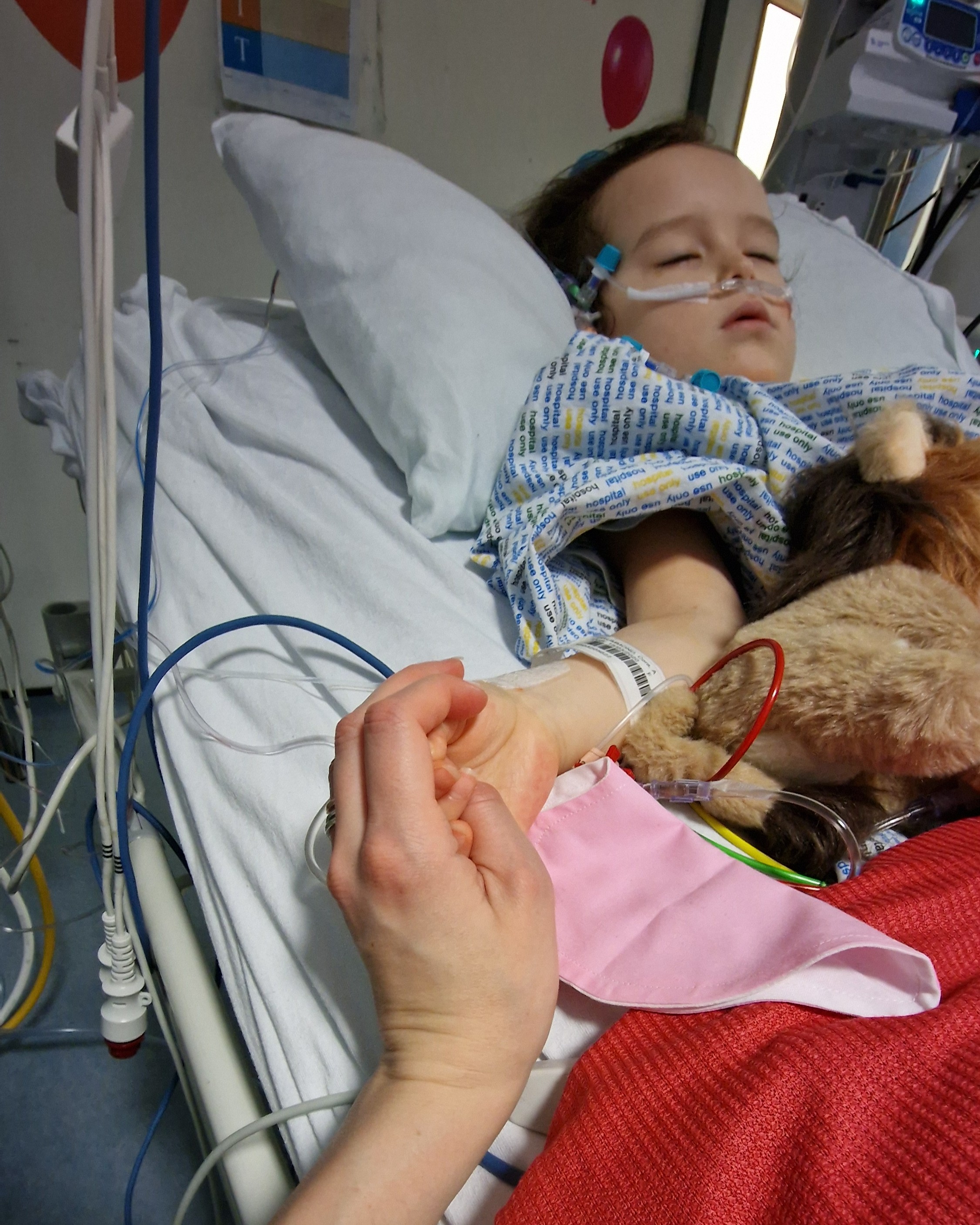 Cora in PICU post surgery