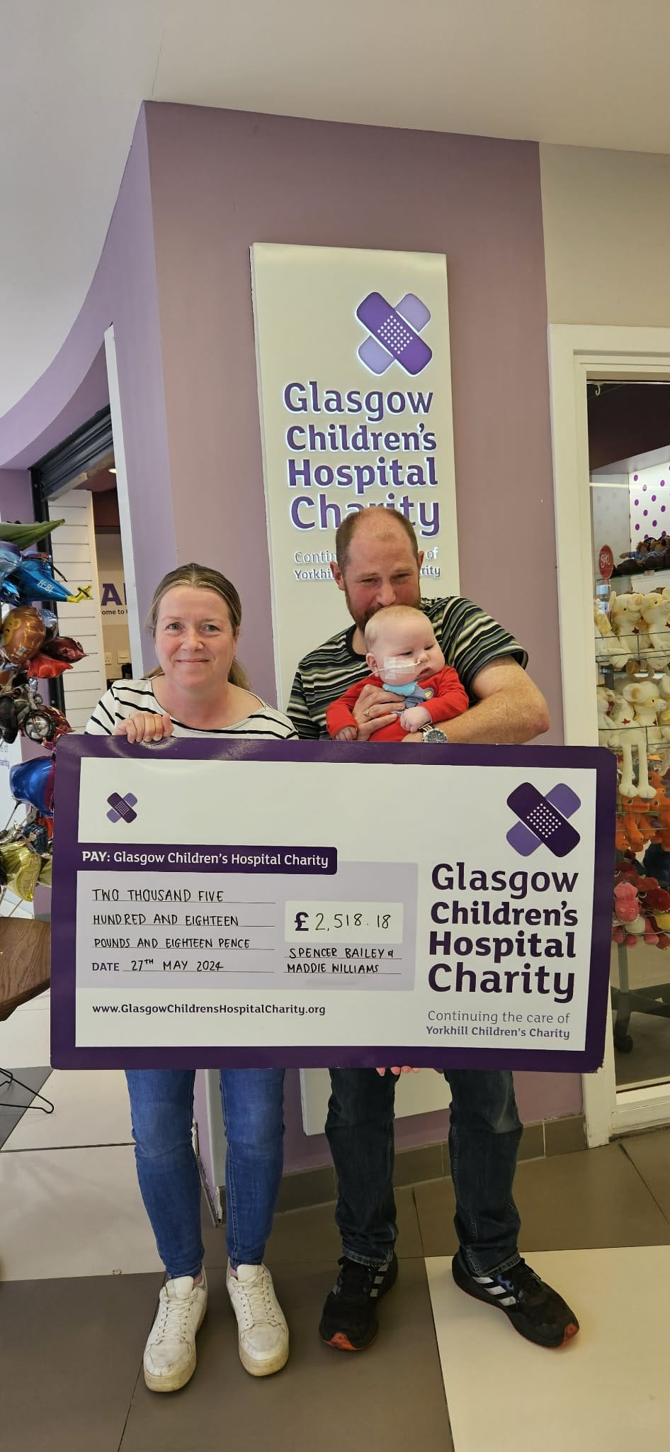 Archie and family cheque presentation